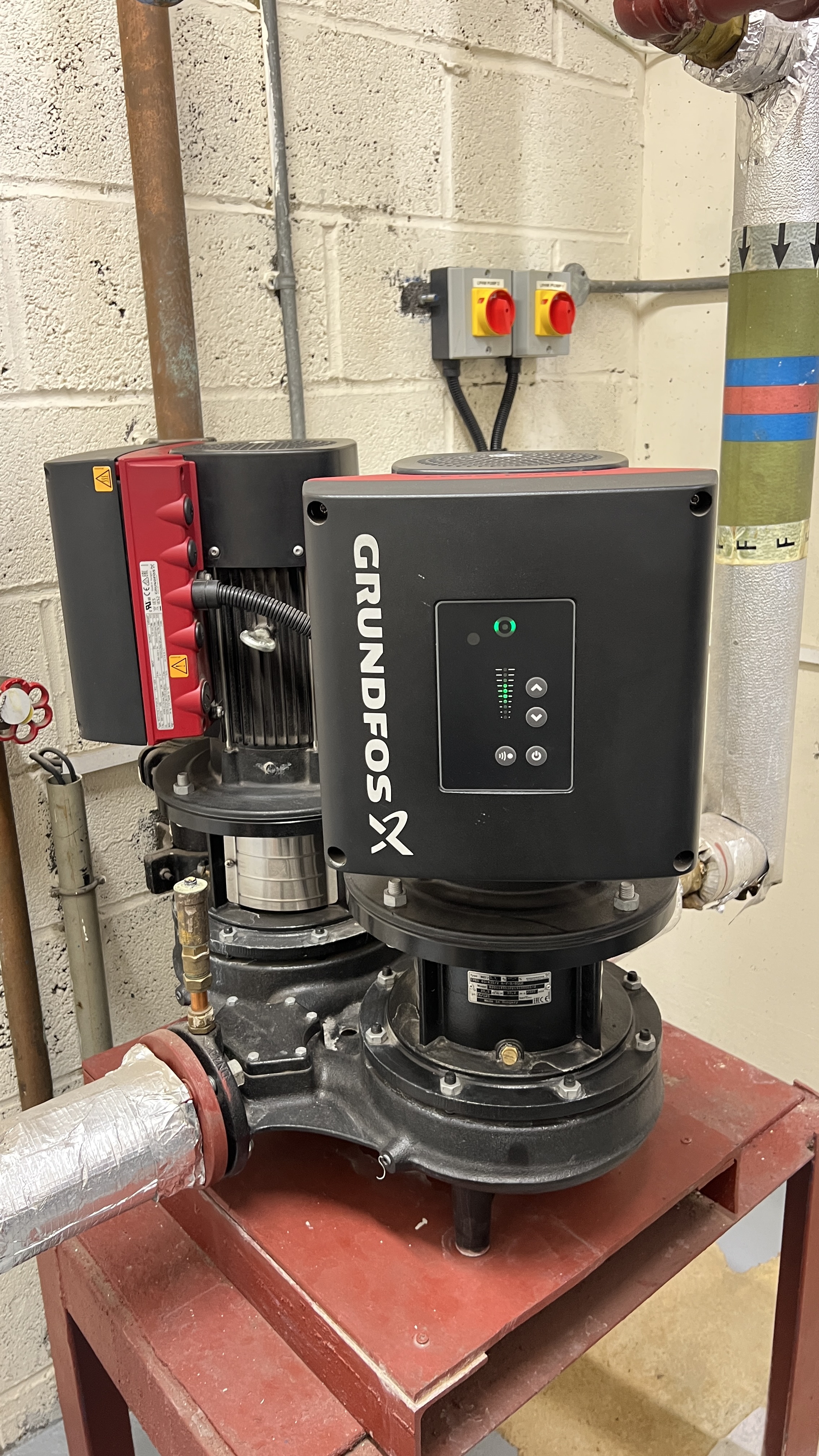 Grundfos X variable speed pump unit on red stand